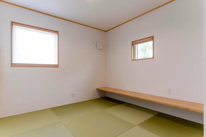 余白をつなぐ土間のある家