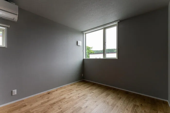 余白をつなぐ土間のある家