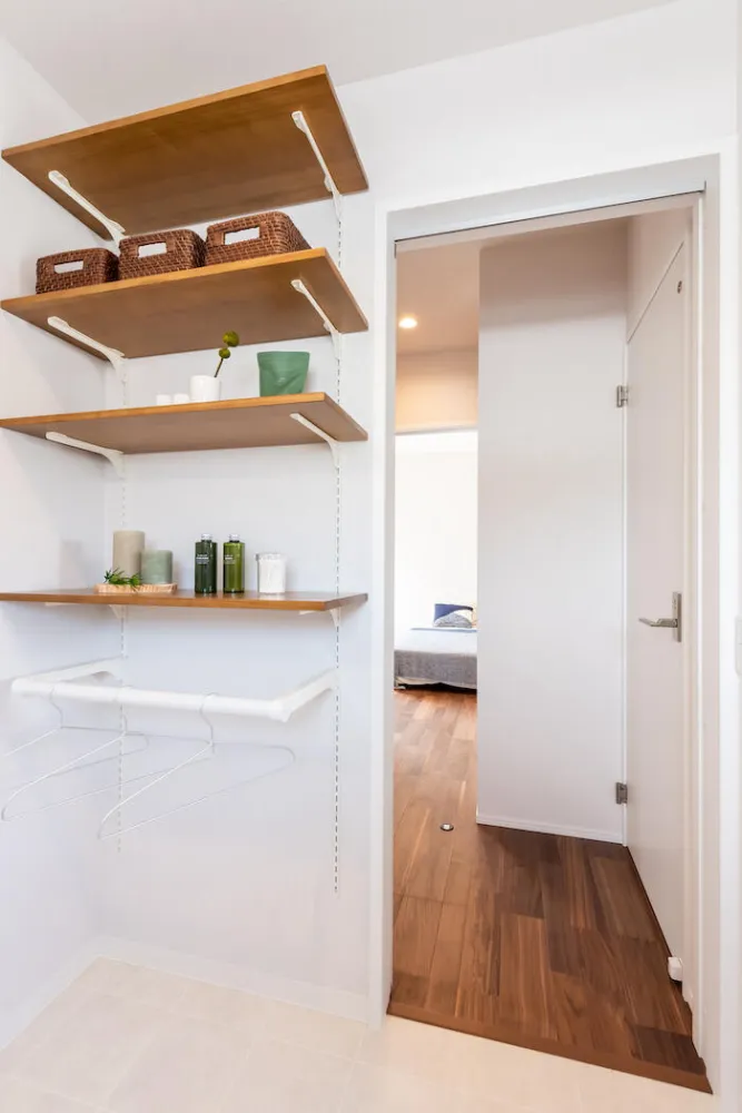 家族の歩みをつつむ勾配天井の家