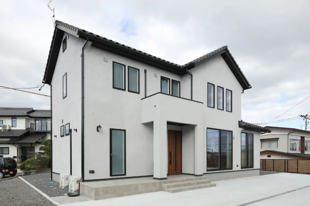 塗り壁と天然無垢材を楽しむ家